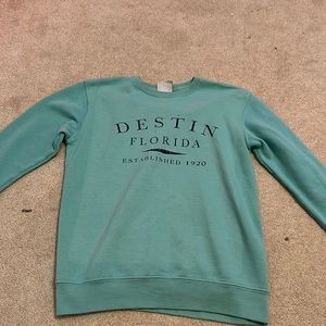 medium destin florida crewneck cyan colored.
